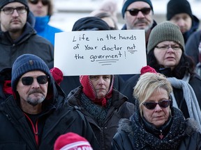 Crohn's and ulcerative colitis patients and supporters protest a possible change to the Alberta government drug plan, in the wake of changes by the B.C. government, in Edmonton on Dec. 1, 2019.