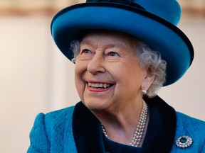 Queen Elizabeth visits the new headquarters of the Royal Philatelic Society in London on Nov. 26, 2019.