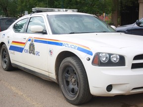 An RCMP car stands on the road in June, 2015.