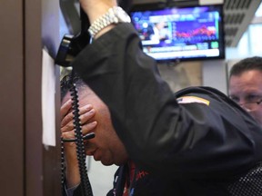 Traders work on the floor of the New York Stock Exchange in December 2018.