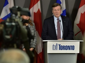 Toronto Mayor John Tory speaks to media  at city hall on Nov. 26, 2019, announcing a new funding model for the Toronto Community Housing Corporation.