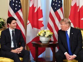 Prime Minister Justin Trudeau with U.S. President Donald Trump meet during a NATO summit in London, England, on Dec, 3, 2019.