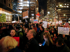 Hundreds of people gather to take part in a rally to support the impeachment and removal of U.S. President Donald Trump outside the federal building in Seattle, Washington, Dec. 17, 2019.