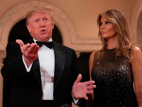 U.S. President Donald Trump and First Lady Melania Trump speak to the press as they arrive for a New Year's celebration at Mar-a-Lago in Palm Beach, Fla., on Dec. 31, 2019.