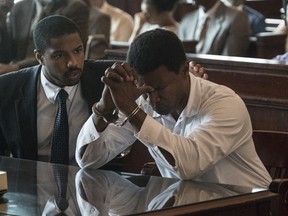 MICHAEL B. JORDAN as Bryan Stevenson and JAMIE FOXX as Walter McMillian.