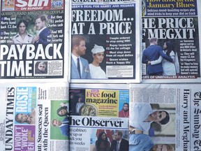 The front pages of London's Sunday newspapers are displayed in London, Sunday, Jan. 19, 2020.
