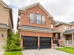 This detached brick home with approximately 2,600 square feet of living space is located in a "nice family neighbourhood."