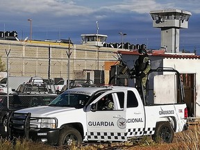 Members of the National Guard remain outside the Regional Center for Social Reinsertion after a riot in Zacatecas, Mexico, on December 31, 2019.