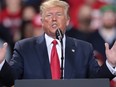 President Donald Trump addresses his impeachment after learning how the vote in the House was divided during a Merry Christmas Rally at the Kellogg Arena