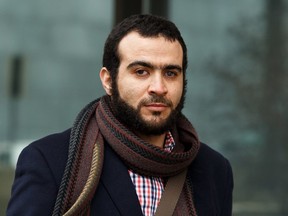 Omar Khadr leaves Court of Queen's Bench in Edmonton, on March 25, 2019 after a judge declared his sentence expired.