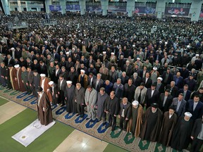 A handout picture provided by the office of Iran's Supreme Leader Ayatollah Ali Khamenei on January 17, 2020 shows him (C) leading Friday prayers in the capital Tehran.