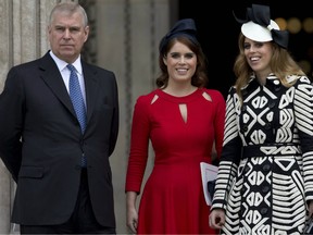 In this file photo taken on June 10, 2016 Britain's Prince Andrew (L), Britain's Princess Eugenie of York (2nd L), Britain's Princess Beatrice of York (R) leave after attending a national service of thanksgiving for the 90th birthday of Britain's Queen Elizabeth II at St Paul's Cathedral in London.