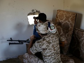 Members of the Libyan internationally recognized government forces take their positions in Ain Zara, Tripoli, Libya October 14, 2019.