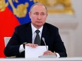 Russian President Vladimir Putin chairs a meeting of the State Council at the Kremlin in Moscow on April 5, 2018.