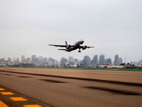 A United Continental Holdings Inc. airplane takes off at San Diego International Airport in San Diego, California, U.S. on Thursday, Sept. 19, 2013. Airlines must reconsider buying new or used aircraft as rising interest rates increase ownership costs, which could outweigh fuel savings at lower prices.