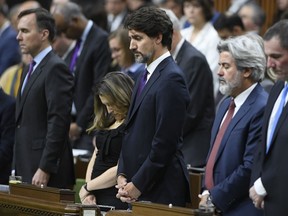 Prime Minister Justin Trudeau and house members observe a moment of silence for the victims of the Ukrainian Airlines plane shot down in Iran, before Question Period in the House of Commons, Monday January 27, 2020 in Ottawa.