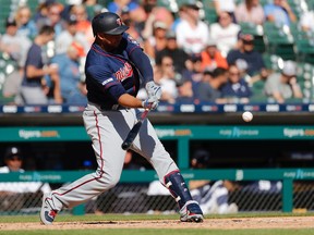 Minnesota Twins designated hitter Jonathan Schoop hits a two run home run in the seventh inning against the Detroit Tigers at Comerica Park.