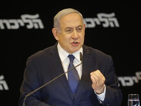 Israeli Prime Minister Benjamin Netanyahu speaks at a press conference regarding his intention to file a request to the Knesset for immunity from prosecution, in Jerusalem on January 1, 2020.