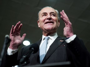 U.S. Senate Democratic Leader Chuck Schumer speaks to reporters during a recess on the third day of the Senate impeachment trial of U.S. President Donald Trump, Jan. 23, 2020.
