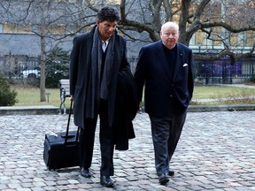 Sen. Mike Duffy arrives with his lawyer Lawrence Greenspon at the Ontario Court of Appeal in Toronto on Thursday, Jan. 16, 2020. Duffy is fighting a court ruling that the Senate is immune from his lawsuit stemming from what he says was his politically motivated two-year suspension that began in 2013.