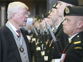 John Crosbie inspects the Guard of Honour after he is sworn in as Newfoundland and Labrador's Lieutenant Governor  at the House of Assembly at Confederation Building in St. John's on Feb. 4, 2008.