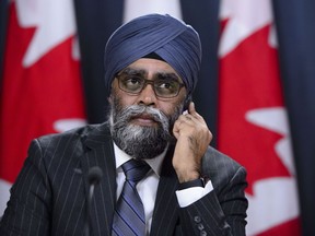 Minister of National Defence Harjit Sajjan takes part in a press conference in Ottawa on Wednesday, Jan. 30, 2019. NATO says it has suspended a training mission for soldiers in the Iraqi army in the wake of the killing of Iranian General Qassem Soleimani.