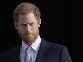 In this Thursday, Jan. 16, 2020, file photo, Britain's Prince Harry arrives in the gardens of Buckingham Palace in London. While Prince Harry is shaking up the British Monarchy, Canada's Supreme Court is being asked to throw out a law that modified the rules governing the succession to the throne.