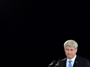 Conservative leader Stephen Harper listens to a question from the media as he makes a campaign stop in Fredricton, New Brunswick on Monday, August 17, 2015. Former prime minister Harper has left his role with the chief fundraising arm of the federal Conservative party, but says he still intends to play a role with the party itself.THE CANADIAN PRESS/Sean Kilpatrick