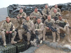 Lionel Desmond (front row, far right) was part of the 2nd battalion, of the Royal Canadian Regiment, based at CFB Gagetown and shown in this 2007 handout photo taken in Panjwai district in between patrol base Wilson and Masum Ghar in Afghanistan. An RCMP investigator has testified about the steps former soldier Desmond took, including researching where to buy a rifle, before he shot three members of his family and himself more than three years ago.