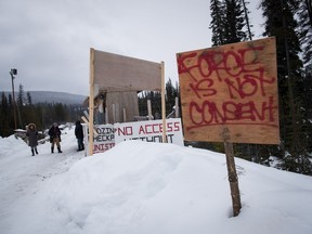 A checkpoint is seen at a bridge leading to the Unist'ot'en camp on a remote logging road near Houston, B.C., on Thursday January 17, 2019. The company building a 670-kilometre natural gas pipeline as part of the massive LNG Canada project in northern British Columbia says it plans to resume construction this week despite an eviction notice served by members of a local First Nation over the weekend.