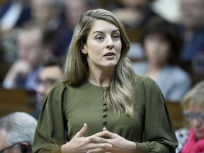 Minister of Tourism, Official Languages and La Francophonie Melanie Joly rises during Question Period in the House of Commons on Parliament Hill in Ottawa on Wednesday, June 5, 2019. The federal and Ontario governments have reached a deal on funding a new French-language university in Toronto.