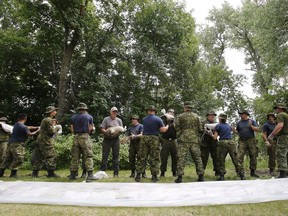 It has become an annual ritual in Manitoba -- mid-winter thoughts turn to the spring melt and whether land and communities will be threatened by rising water that comes from rivers as far away as the Rocky Mountains and South Dakota. Soldiers from 17 Wing in Winnipeg sandbag in St. Francois Xavier, Man., Tuesday, July 8, 2014.