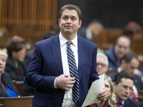 Leader of the Opposition Andrew Scheer rises to announce he will step down as leader of the Conservatives in the House of Commons in Ottawa on December 12, 2019. Conservative Leader Andrew Scheer gathers his MPs and senators around him today to plot strategy for Parliament's return on Monday. The caucus retreat comes at a time when many Tories are plotting their own strategies for how best to replace Scheer.