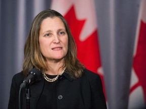 Minister of Intergovernmental Affairs and Deputy Prime Minister Chrystia Freeland speaks to the media during a press scrum on the second day of the Liberal cabinet retreat at the Fairmont Hotel in Winnipeg, Monday, Jan. 20, 2020. Freeland is asking the Opposition parties not to hold up the new North American free trade deal.THE CANADIAN PRESS/Mike Sudoma