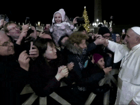 A gif showing the pope smacking a pilgrim on Dec. 31, 2019 during a walkabout in St. Peters Square.
