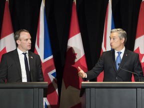 Minister of Foreign Affairs Francois-Philippe Champagne, right, and Dominic Raab the United Kingdom's Foreign Secretary and First Secretary of State speak to reporters following a meeting in Montreal, Thursday, January 9, 2020.