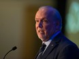 B.C. Premier John Horgan speaks at a Truck Loggers Association luncheon in Vancouver on Jan. 16, 2020. Horgan had vowed his government would “use every tool in the tool box” to try to block the expansion of the Trans Mountain pipeline.