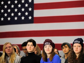 Audience members listen as Democratic 2020 U.S. presidential candidate Sen. Elizabeth Warren speaks at a town hall meeting in Des Moines, Iowa, on Jan. 19, 2020.