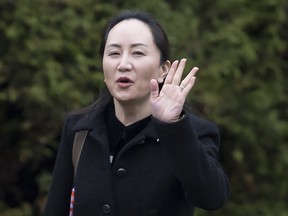 Meng Wanzhou, chief financial officer of Huawei leaves her home in Vancouver, Monday, January, 20, 2020. A court hearing begins today in Vancouver over the American request to extradite an executive of the Chinese telecom giant Huawei on fraud charges.