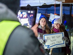 Participants in a Bell Let's Talk event to support mental-health programs have their photo taken in 2014.