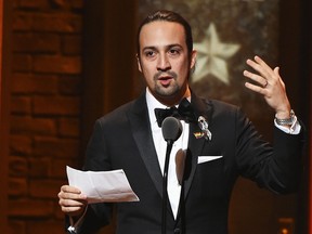 Songwriter Lin-Manuel Miranda accepts the award for Best Book of A Musical for his work in Hamilton during the Tony Awards on June 2016.