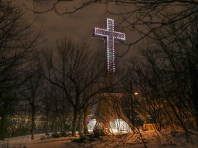 The cross on Mount Royal sits above Montreal in a file photo from Dec. 20, 2018.