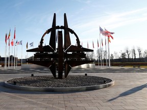 A man stands outside NATO headquarters in Brussels, Belgium January 6, 2020.