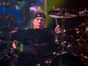 Drummer Neil Peart performs during a Rush concert at the Scotiabank Saddledome in Calgary, Alta., on Wednesday, July 15, 2015. Peart passed away at 67 years old, due to brain cancer.