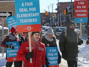 Public elementary school teachers picket during a one-day strike in Ottawa on Jan. 20, 2020.