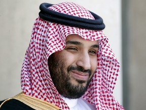 Saudi Arabia's Deputy Crown Prince Mohammed bin Salman reacts upon his arrival at the Elysee Palace in Paris, France in this June 24, 2015.