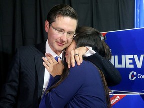 Pierre Poilievre embraces his wife, Anaida, after winning his seat in the Ottawa riding of Carlton in the Oct. 21, 2019, federal election.