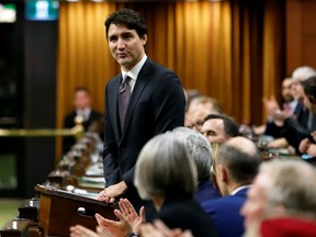 Canada's Prime Minister Justin Trudeau welcomes Members of Parliament to the House of Commons as parliament prepares to resume for the first time since the election in Ottawa, Ontario, Canada December 5, 2019.