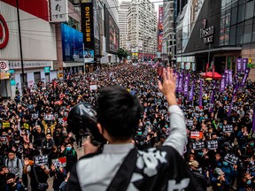 Tens of thousands of people take part in a pro-democracy rally in Hong Kong on Jan. 1, 2020.