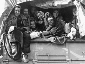 Women released from the Ravensbruck concentration camp arrive in Switzerland on a ICRC truck.